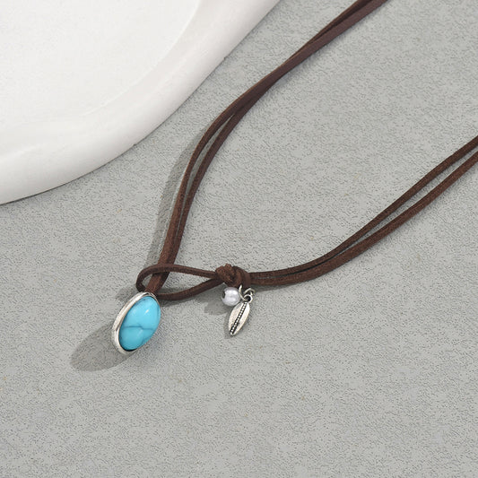 Collar con colgante geométrico vintage para mujer con incrustaciones de turquesa sobre cadena de cuero de doble capa de aleación de zinc