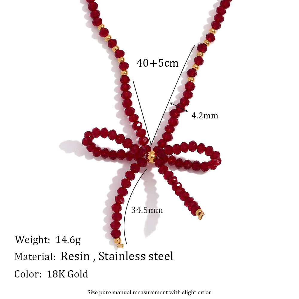 Elegante Collar de Acero Inoxidable con Forma de Lazo, Colgante de Cristal Rojo Multifacetado y Acabado Galvanizado para Mujer
