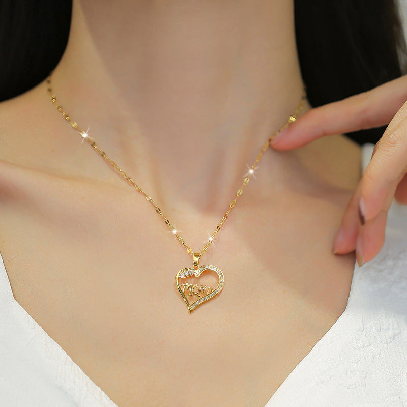 Elegant Hollow Heart Letter Floral Pendant Necklace for Women in Titanium Steel with Rhinestone Inlay and Delicate Clavicle Chain
