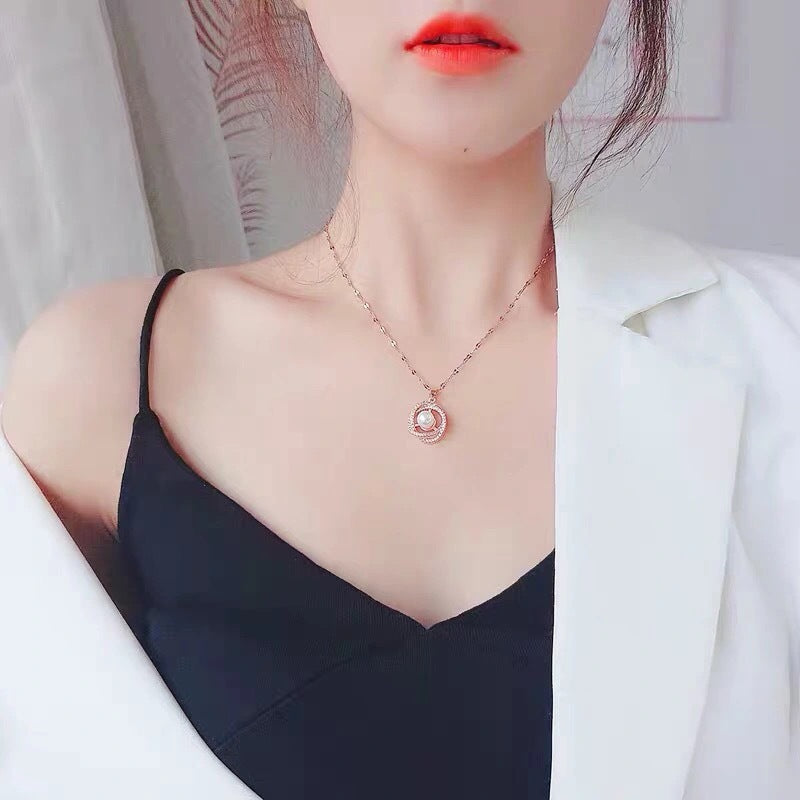 Geometric Pendant Necklace in Titanium Steel with 18K Gold Plating, Micro-Paved Rhinestones, Pearl Accents, and Wavy Chain