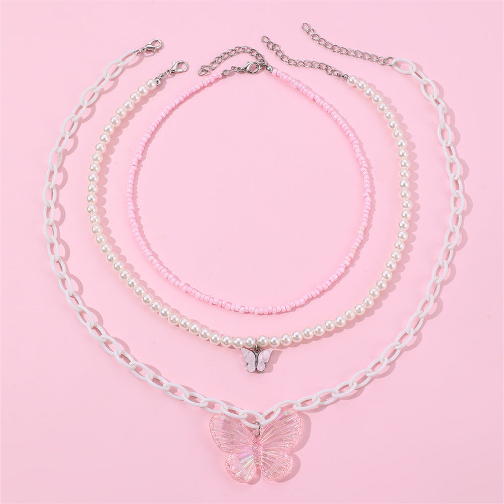 Set collana con ciondolo a farfalla rosa per bambine con ciondolo in resina e catena di perle in stile principessa per primavera ed estate