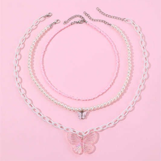 Conjunto de collar con colgante de mariposa rosa para niñas con colgante de resina y cadena de perlas en estilo princesa para primavera y verano