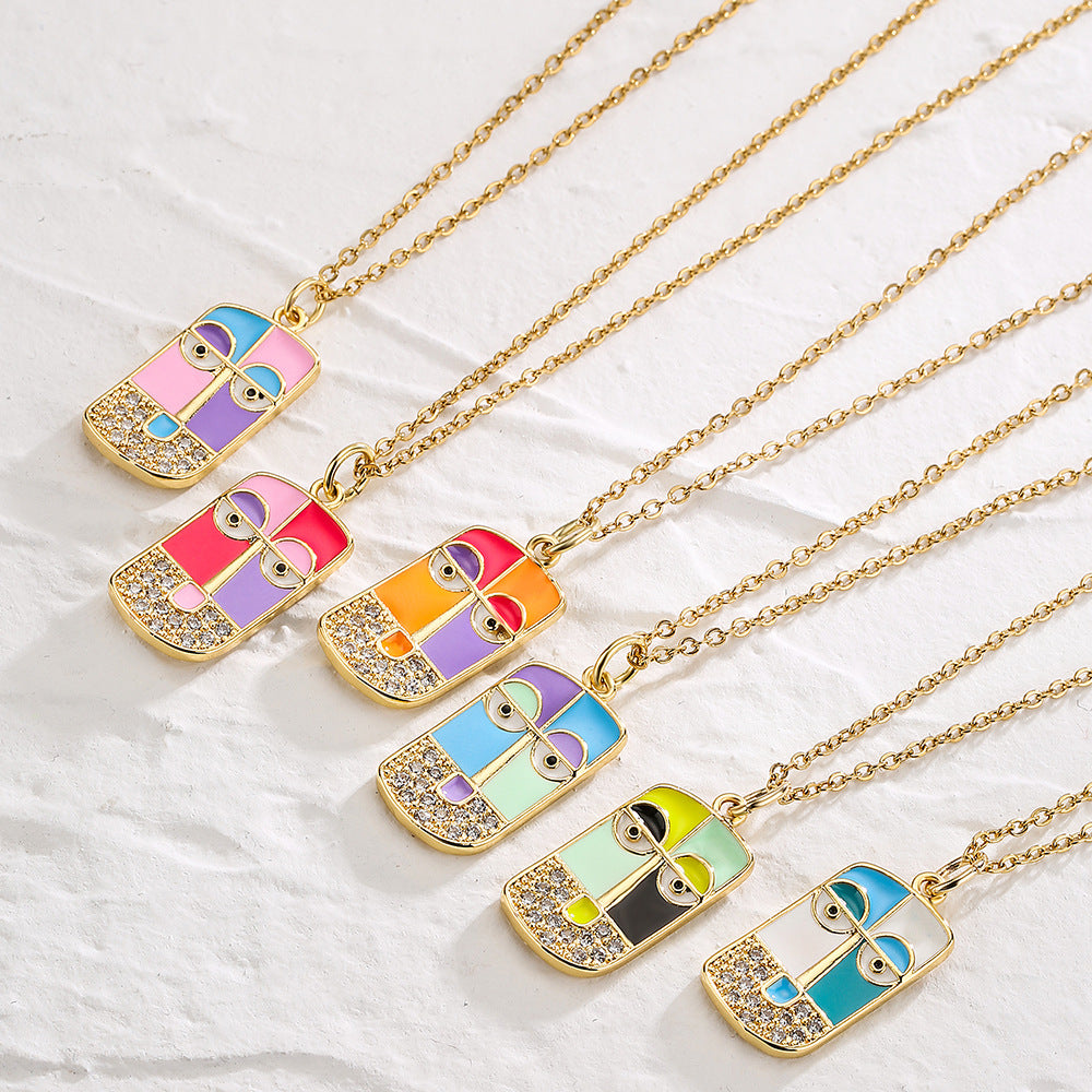 Collana con ciondolo in rame geometrico creativo placcato oro con intarsio di strass e design a ritratto smaltato per donna