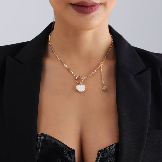 Minimalist Geometric White Mother-of-Pearl Inspired Clavicle Necklace for Women with Heart Pendant and Tassel Detail