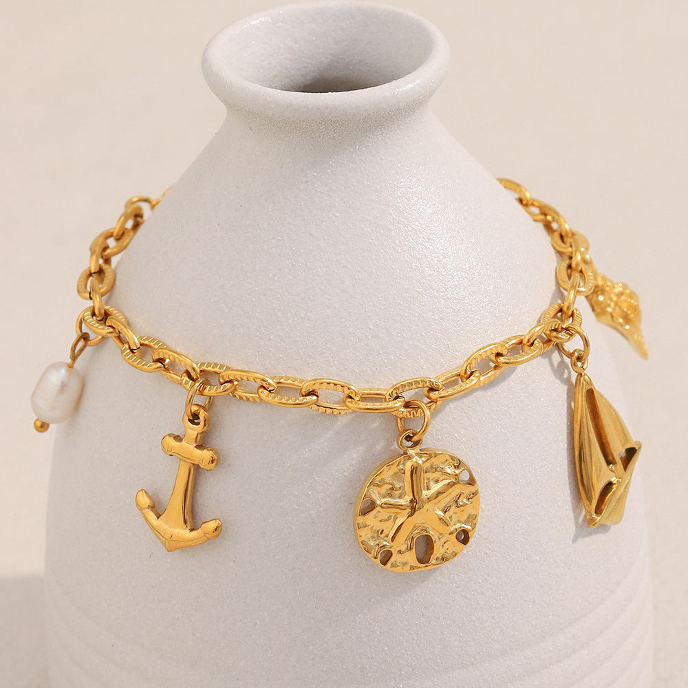 Elegante pulsera con colgante de estrella de mar de acero inoxidable chapado en oro de 18 quilates, geométrica, con temática oceánica para mujer