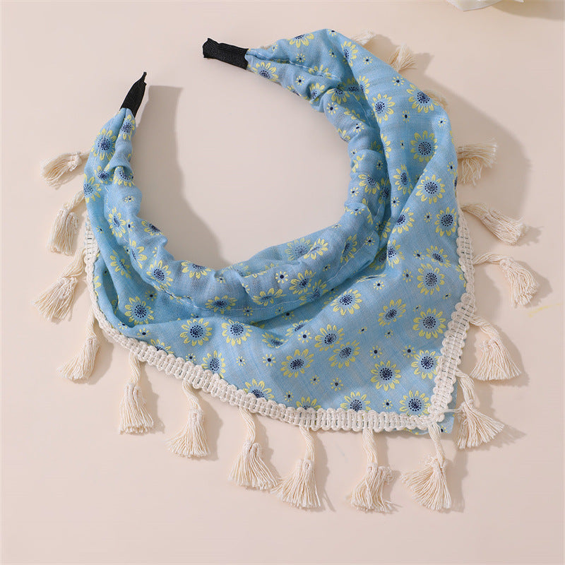 Diadema infantil con estampado floral bohemio con borlas y ribete de encaje en tela