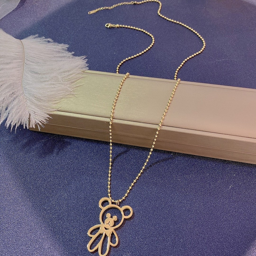 Collana con ciondolo a orsetto vuoto dolce minimalista in acciaio al titanio con finitura placcata su catena a serpente da donna