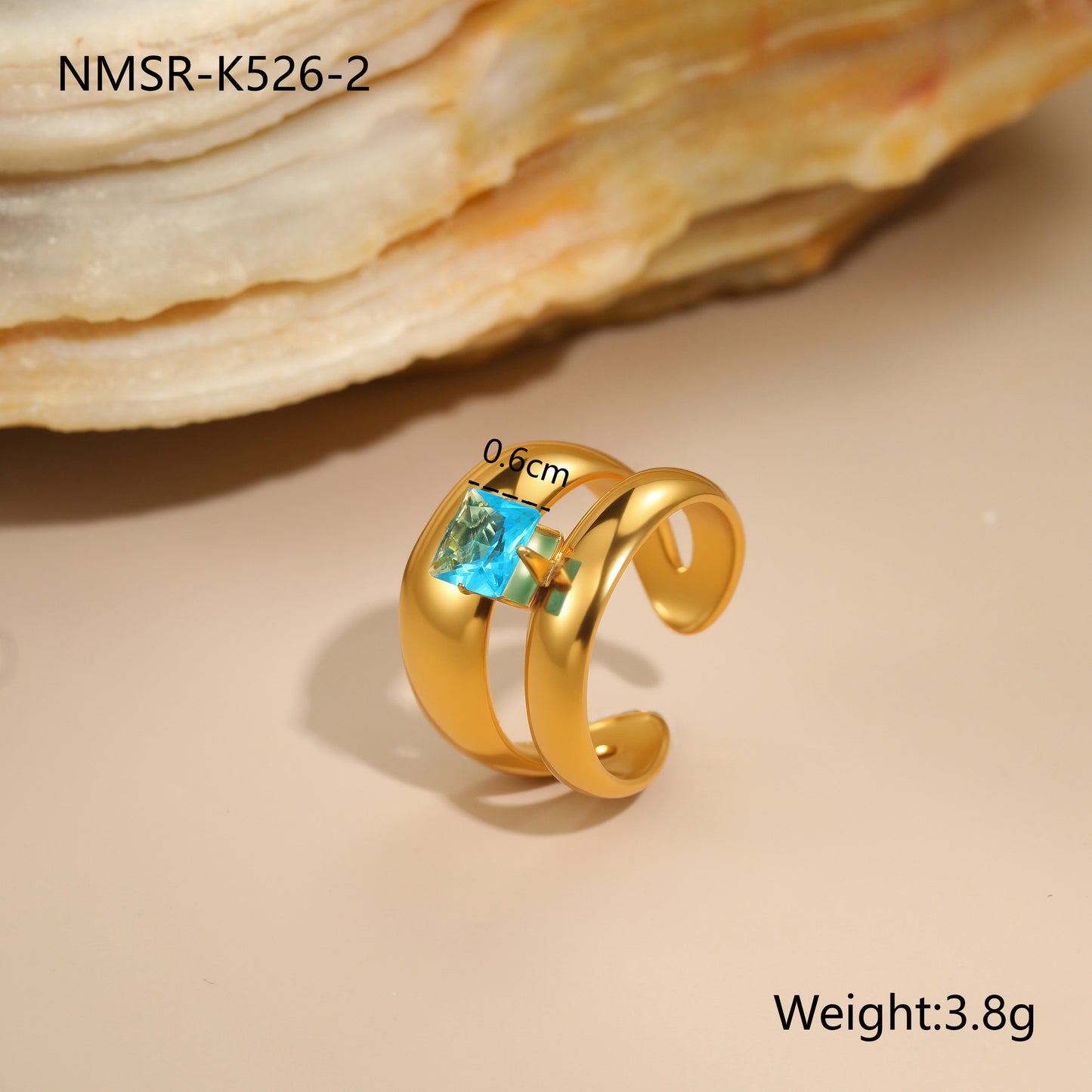 Anillo minimalista de acero inoxidable hueco geométrico con incrustaciones de circonita azul y baño de oro de 18 quilates para mujer
