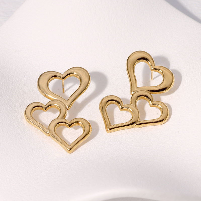 Orecchini a perno minimalisti da donna in acciaio inossidabile a forma di cuore cavo con finitura placcata