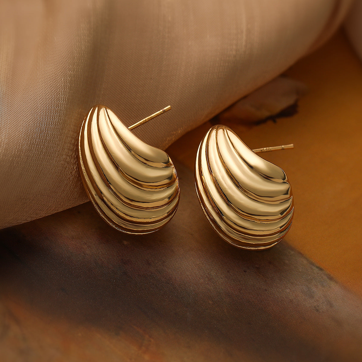 Minimalist Spiral Teardrop Earrings for Women in Copper with Gold Plating and Micro-Pave Setting