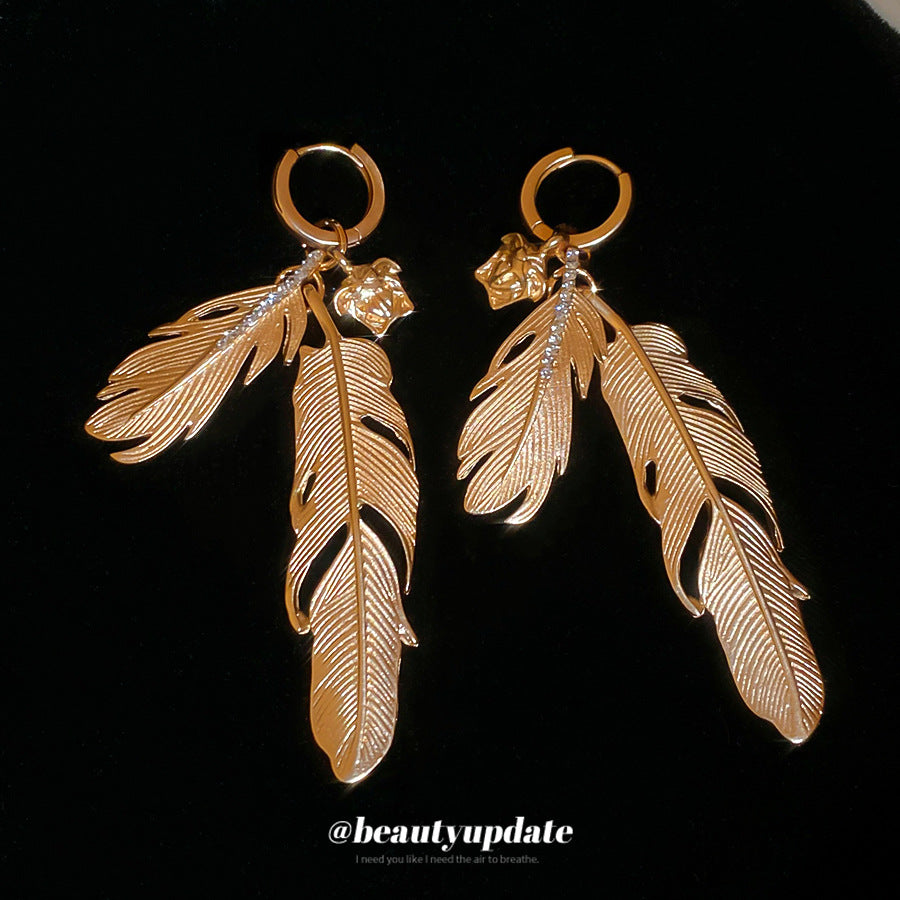 Pendientes de tuerca retro franceses de aleación con forma de pluma e incrustaciones de diamantes de imitación para mujer, joyería única y minimalista de lujo para la oreja