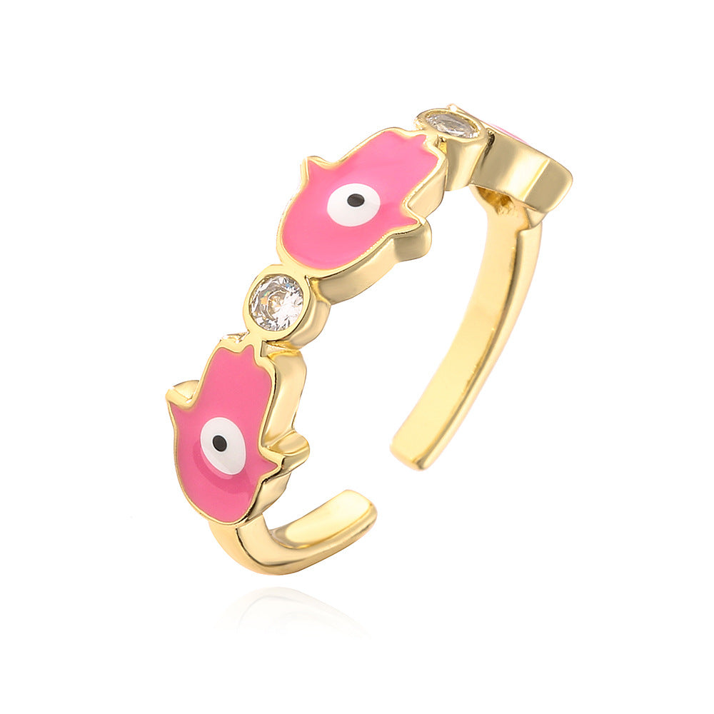 Anello da donna in rame con placca in oro 18K, finitura smaltata e intarsio in zircone, design Mano di Fatima