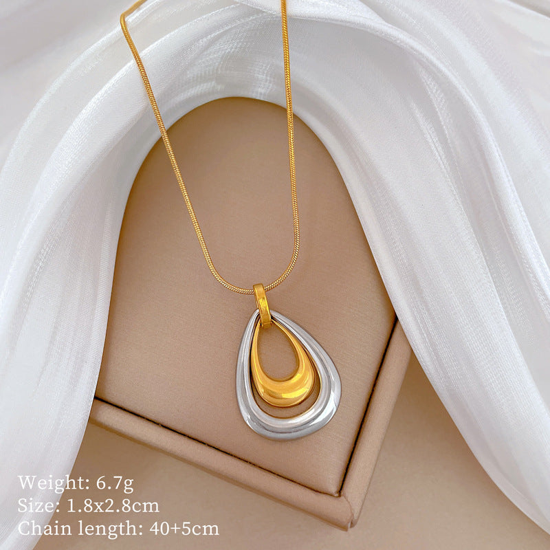 Collana con pendente geometrico minimalista in titanio e acciaio placcato unisex