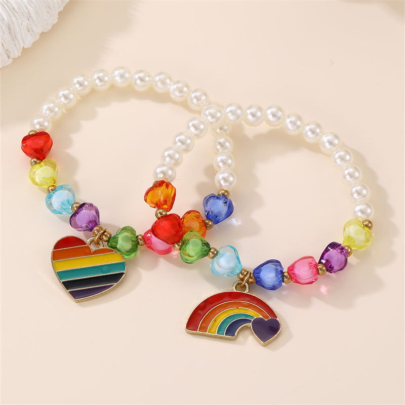 Bracciale per Bambine con Ciondolo a Cuore Floreale e Arcobaleno in Resina Plastica con Perline e Stella