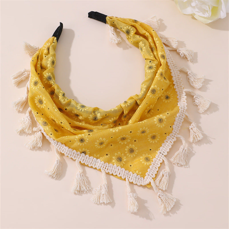 Diadema infantil con estampado floral bohemio con borlas y ribete de encaje en tela