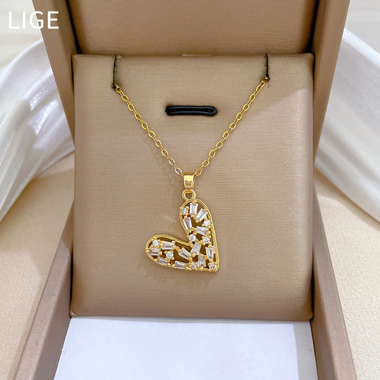 Collar de acero de titanio con forma de corazón hueco y circonitas incrustadas para mujer con delicada cadena de medallón, joyería minimalista elegante y versátil