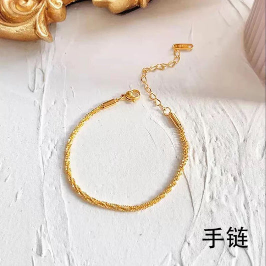 Bracciale Intrecciato Minimalista Cielo Stellato da Donna con Design a Foglia in Lega di Rame Placcata Oro e Dettagli a Petalo Floreale