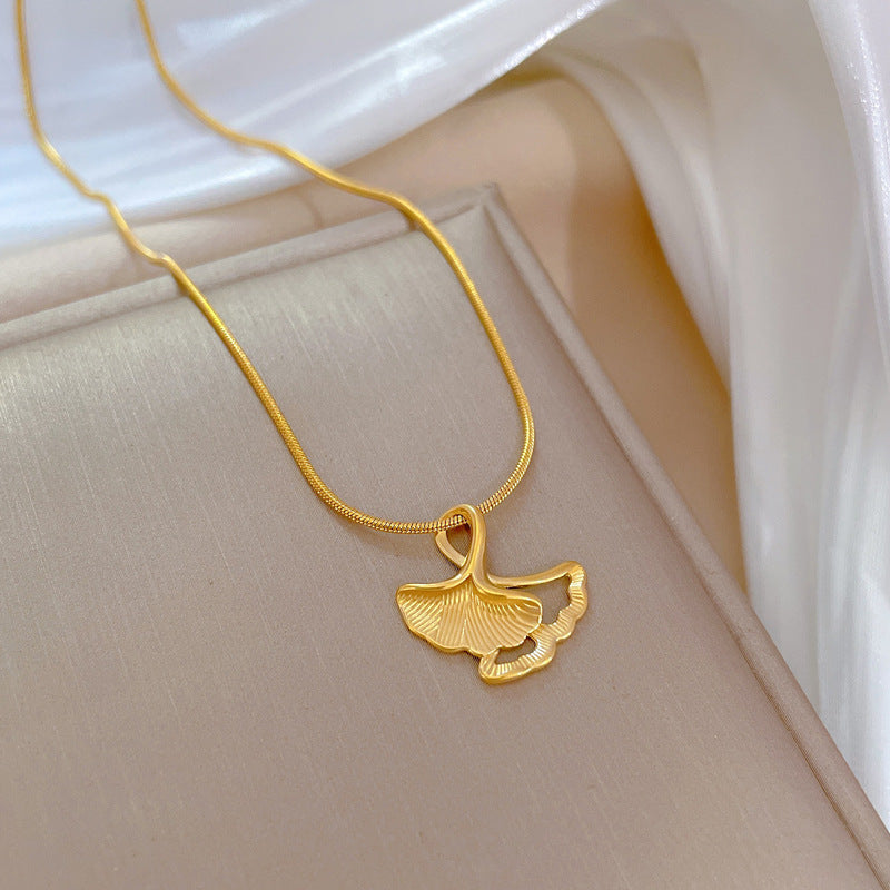 Minimalist Ginkgo Leaf Pendant Necklace in Titanium Steel with Rhinestone Inlay for Women