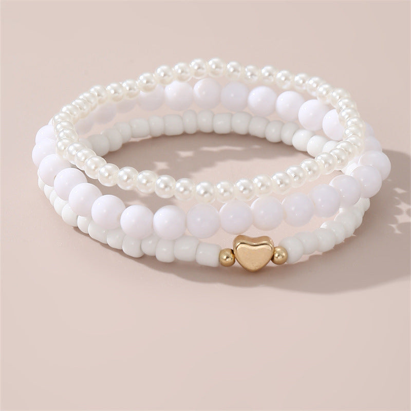 Bracciale minimalista a forma di cuore con perle finte per bambine dai 6 ai 10 anni e oltre, elegante gioiello da mano con finitura artigianale