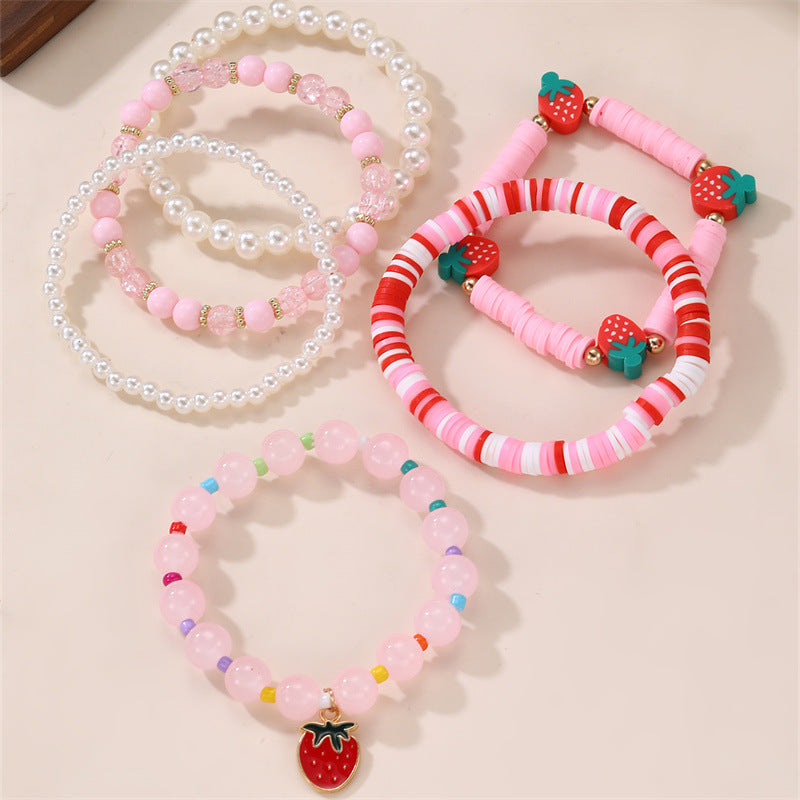 Bracciale per bambine con ciondolo a fiocco, perline acriliche e design a forma di stella