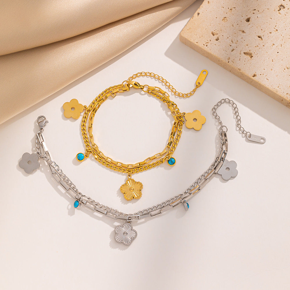 Bracciale da donna in acciaio al titanio con fiore a cinque petali geometrico minimalista, placcatura in oro 18 carati e finitura ipoallergenica