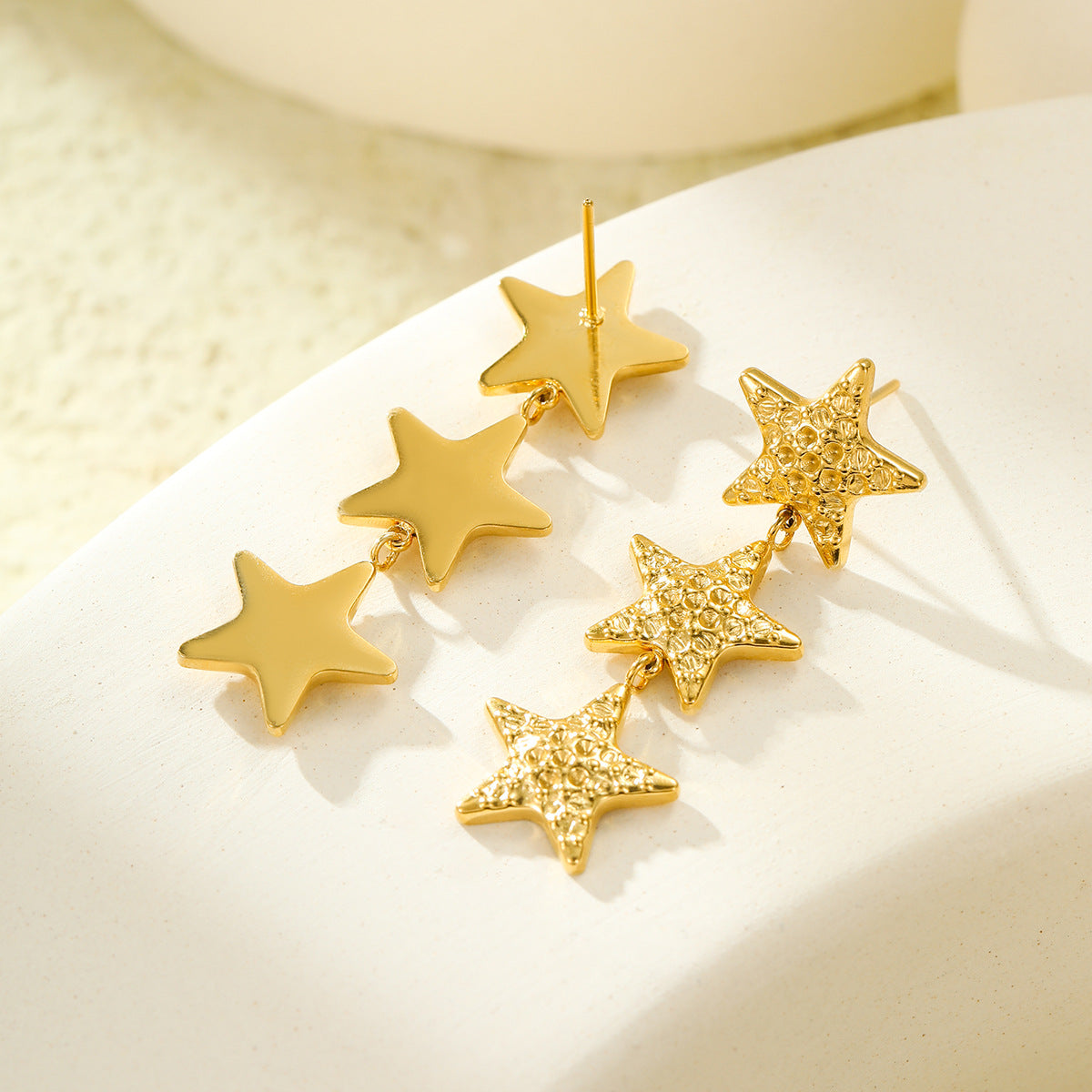 Pendientes de mujer de acero inoxidable vintage con textura martillada, diseño de estrella y borlas