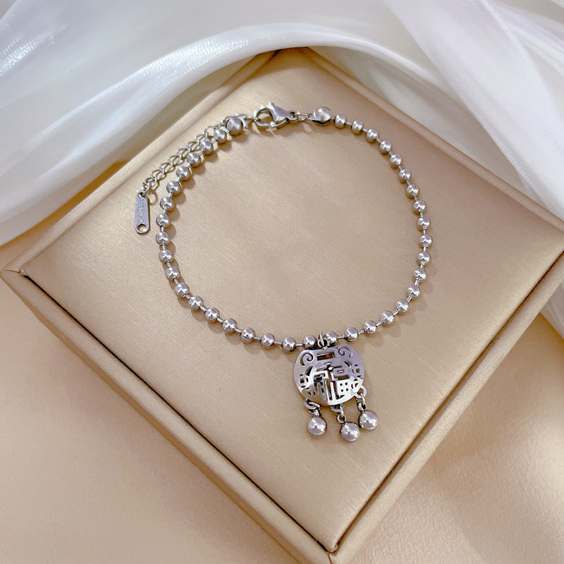 Pulsera de titanio chapada en oro con diseño de cierre Feng Shui para la longevidad, inspirada en Corea, con cuentas redondas y temática de la naturaleza para mujer