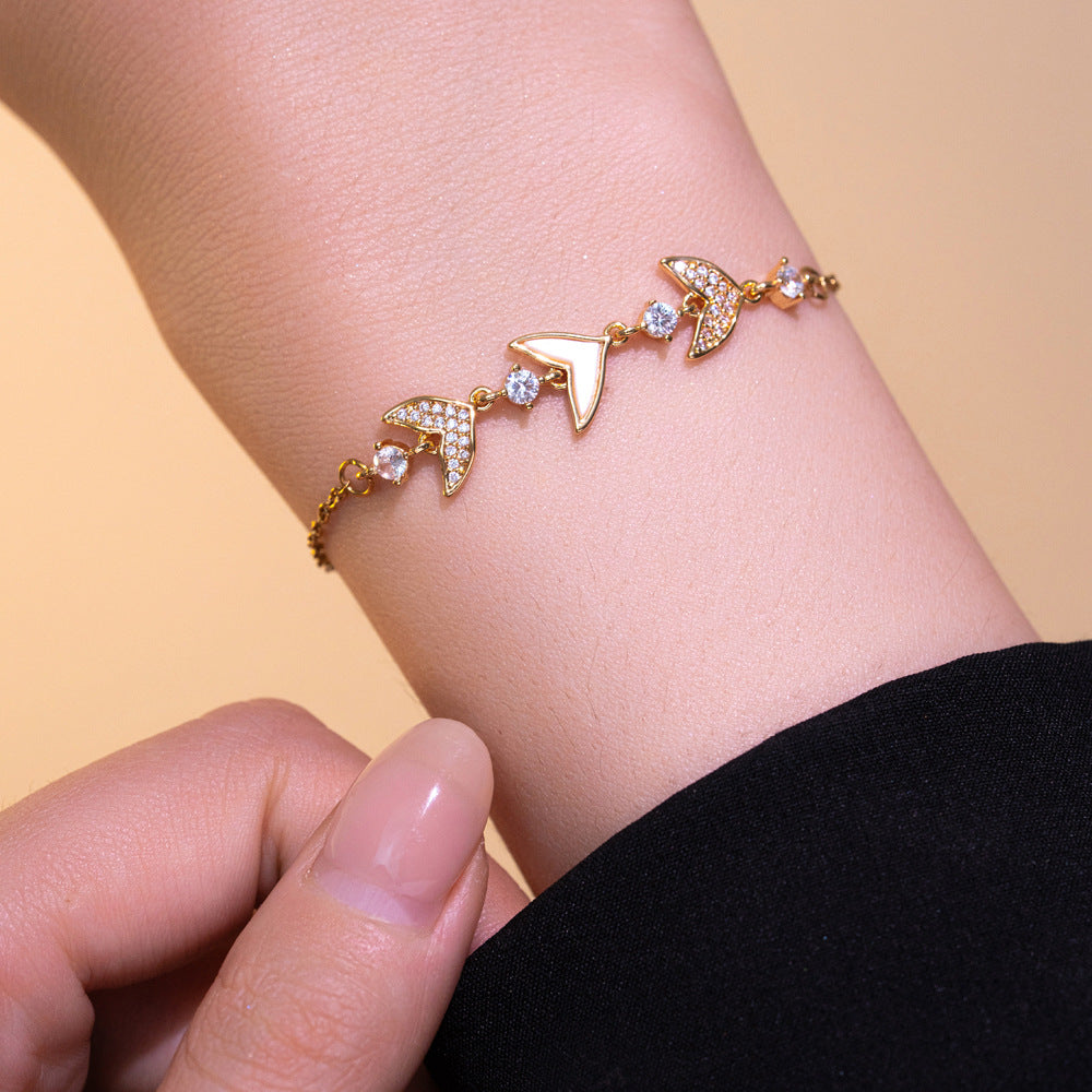 Elegante Pulsera Ajustable de Concha y Cola de Sirena para Mujer con Zirconia Microengarzada en Acero de Titanio con Chapado al Vacío Hipoalergénico
