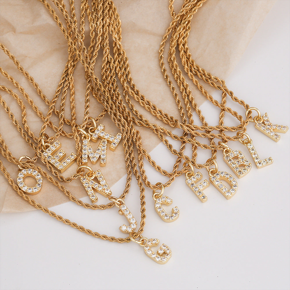 Collar con colgante de letra para mujer, minimalista, de moda, cadena trenzada de acero inoxidable con baño de oro e incrustaciones de circonita