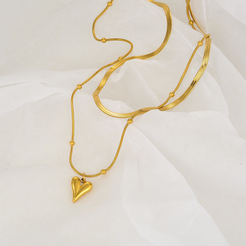 Collar colgante de corazón doble minimalista en acero inoxidable con acabado chapado para mujer y hombre
