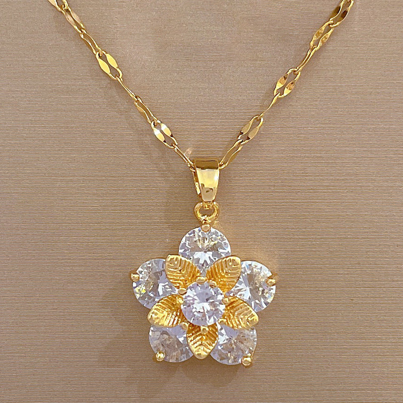 Set di gioielli placcati in acciaio al titanio con ciondolo a fiore, collana e orecchini di lusso