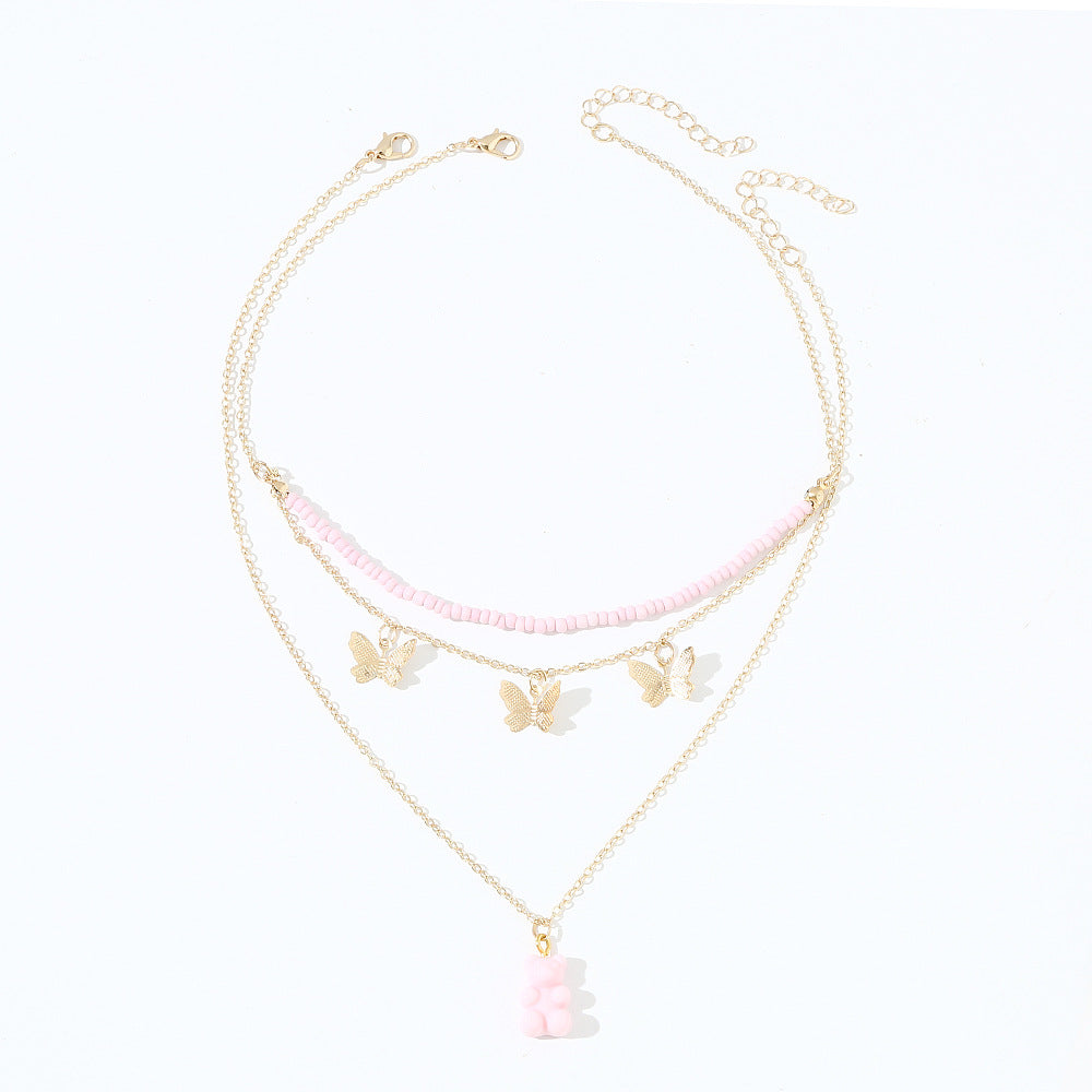 Conjunto de collar con colgante de oso lindo para niños en cuentas rosas con material de resina y estilo de cadena de placa retorcida