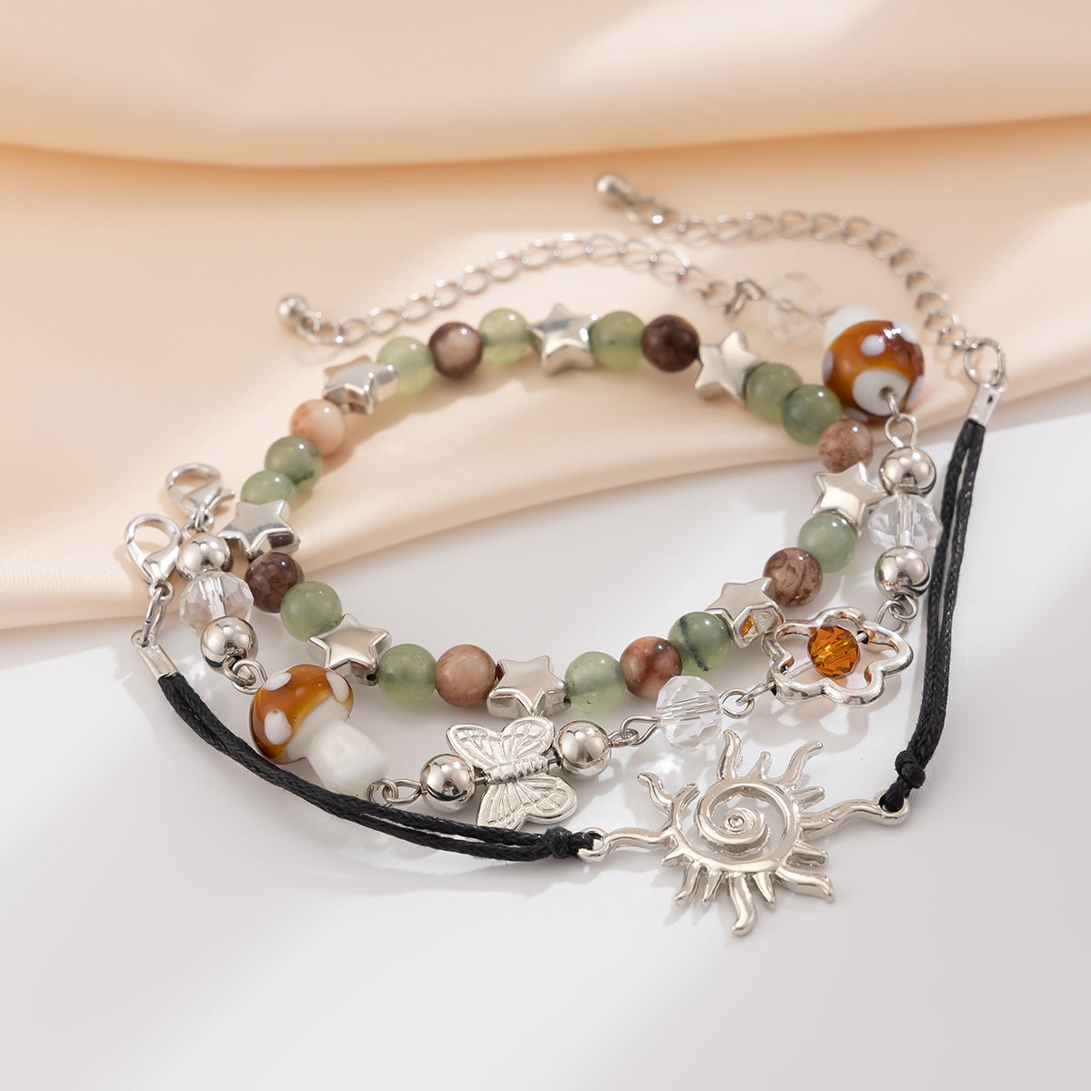 Bracciale da donna in stile etnico vintage a forma di stella, con perline, strass e finitura placcata