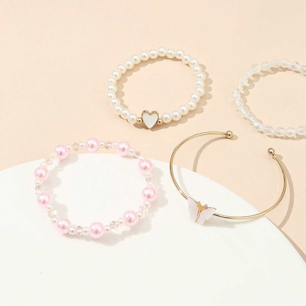 Juego de pulseras de aleación con forma de corazón y mariposa para niñas con detalles de perlas, pulsera de moda minimalista para niñas