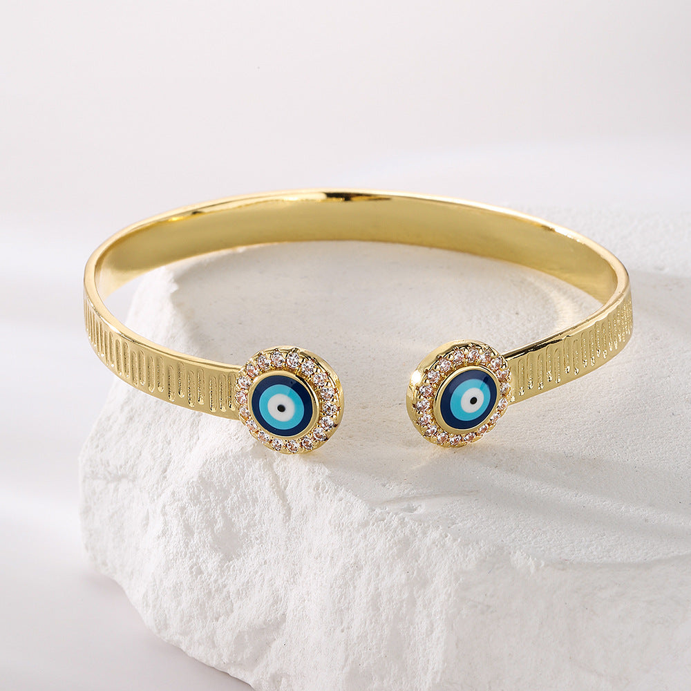 Minimalist Fashion Eye-Shaped Copper Bracelet with 18K Gold Plating and Zircon Inlay for Women