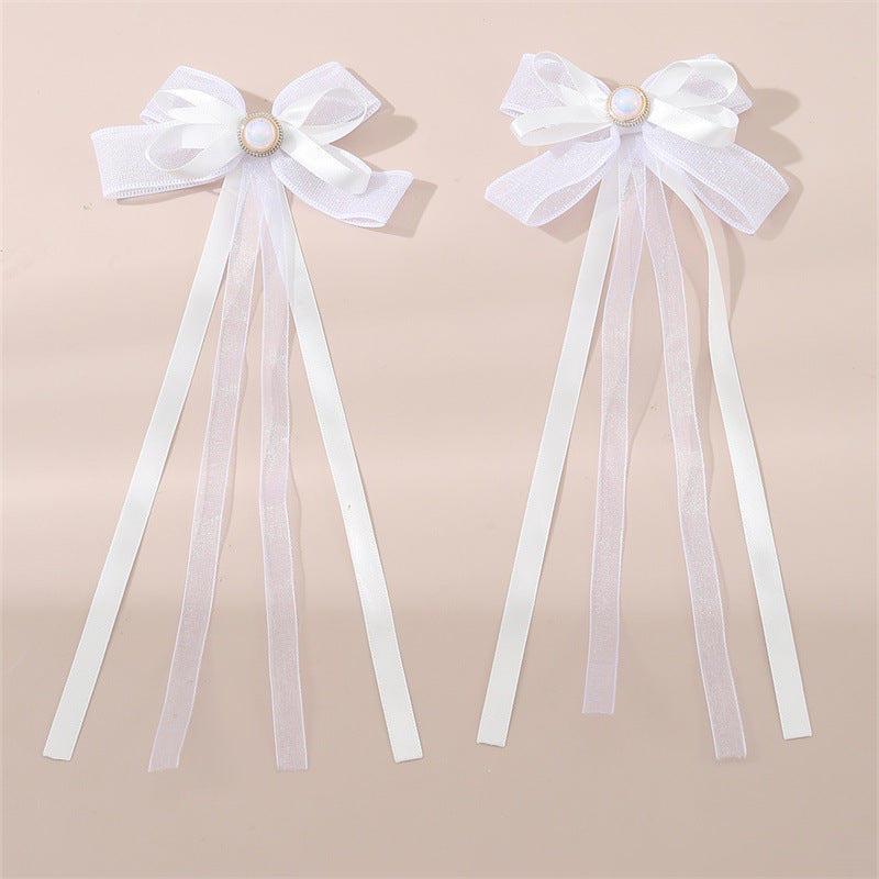 Set di fermagli per capelli in tessuto a forma di fiocco con nastri lunghi e fluenti per bambini, accessori per capelli minimalisti fatti a mano