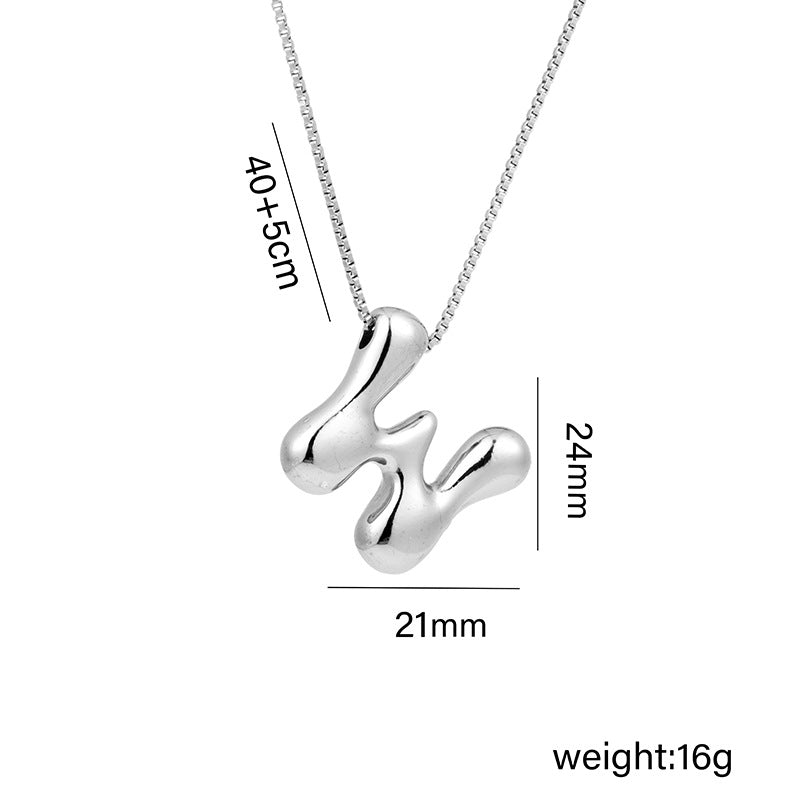 Collar con colgante de acero titanio con forma de letra minimalista y chapado en oro para mujer
