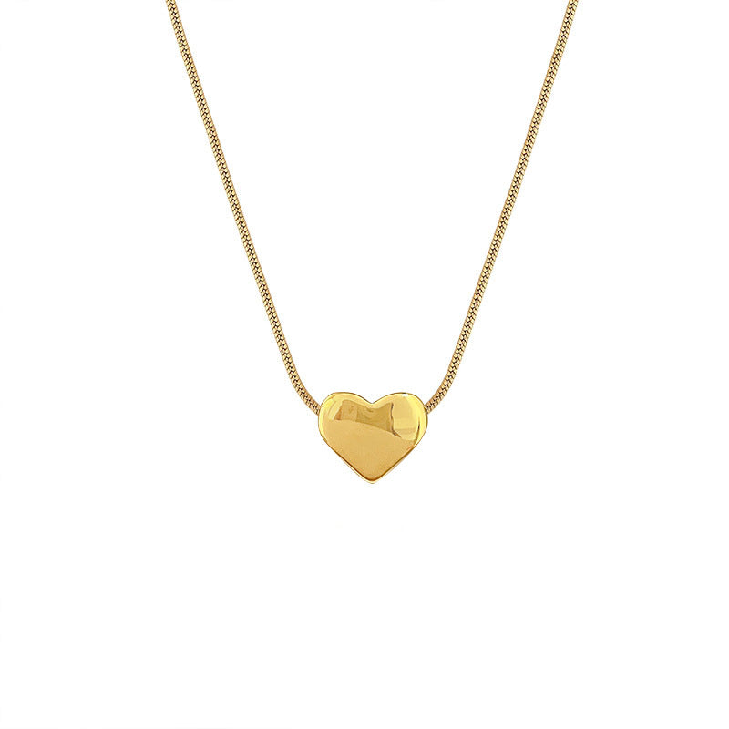 Collana a catena con serpente in acciaio al titanio a forma di cuore minimalista placcata in oro per donne e uomini