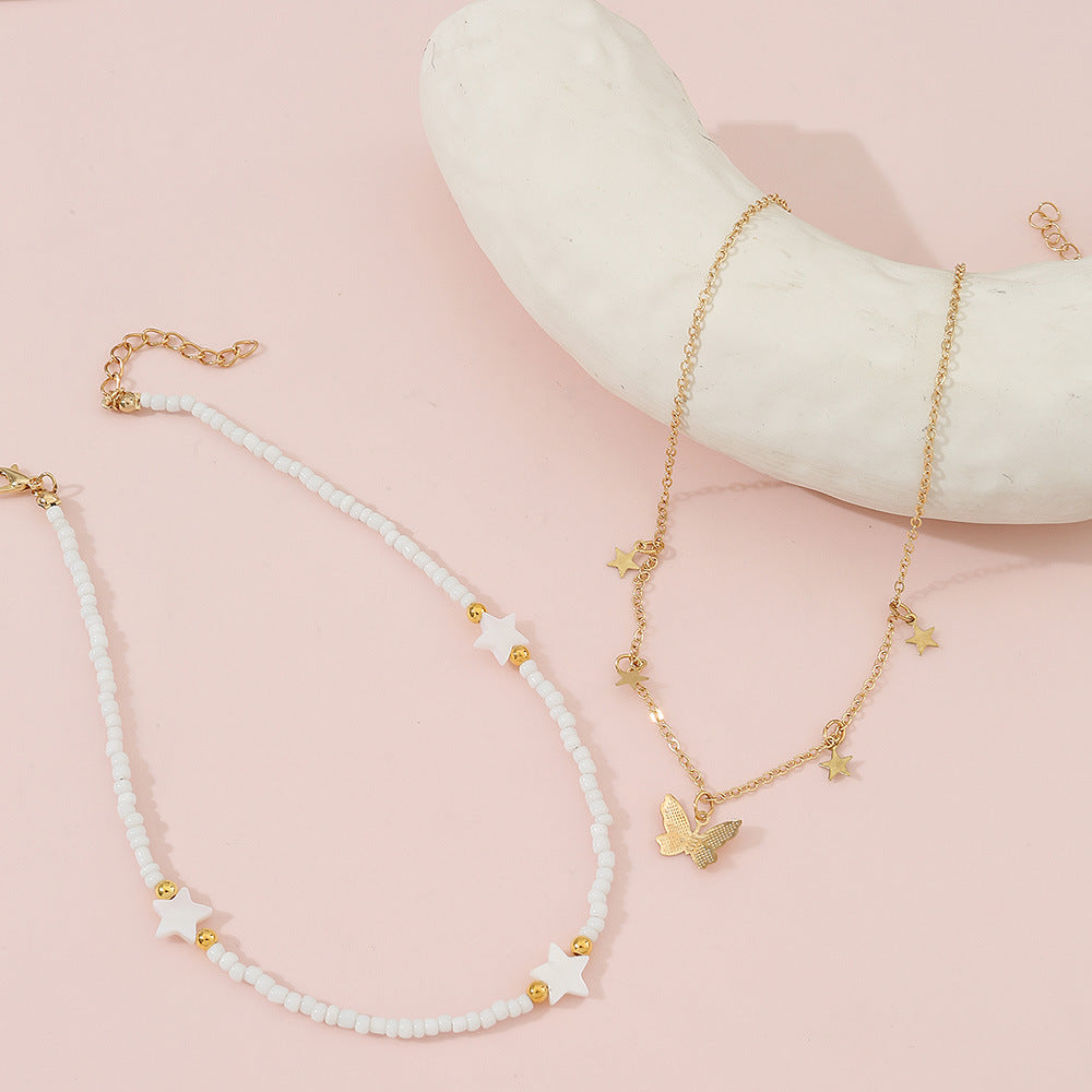 Set di collane in lega a forma di stella minimalista per bambine con catena di perline rotonde e finitura artigianale