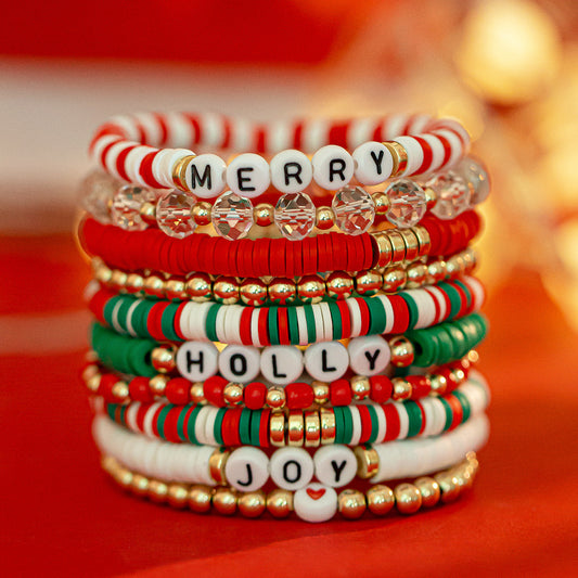 Set di braccialetti natalizi fatti a mano in argilla polimerica stile cartone animato con perline a forma di pupazzo di neve, perline con lettere, cuore, stella, forme geometriche da donna