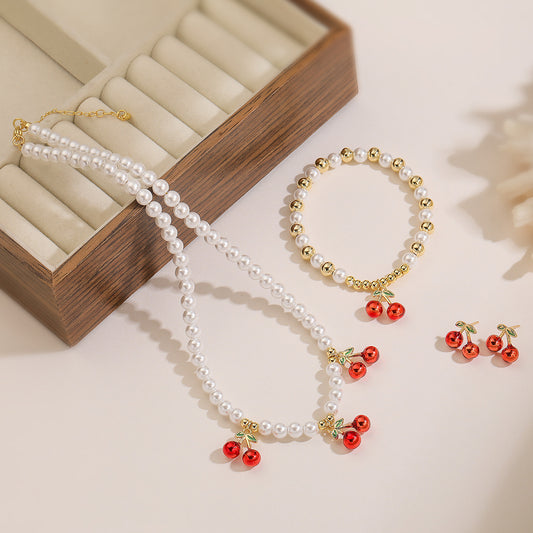 Minimalist Cherry-Shaped Pendant Necklace Set with Copper Base Plated in 18K Gold and Enamel Finish, Featuring Zircon Inlay and Irregular Design for Women