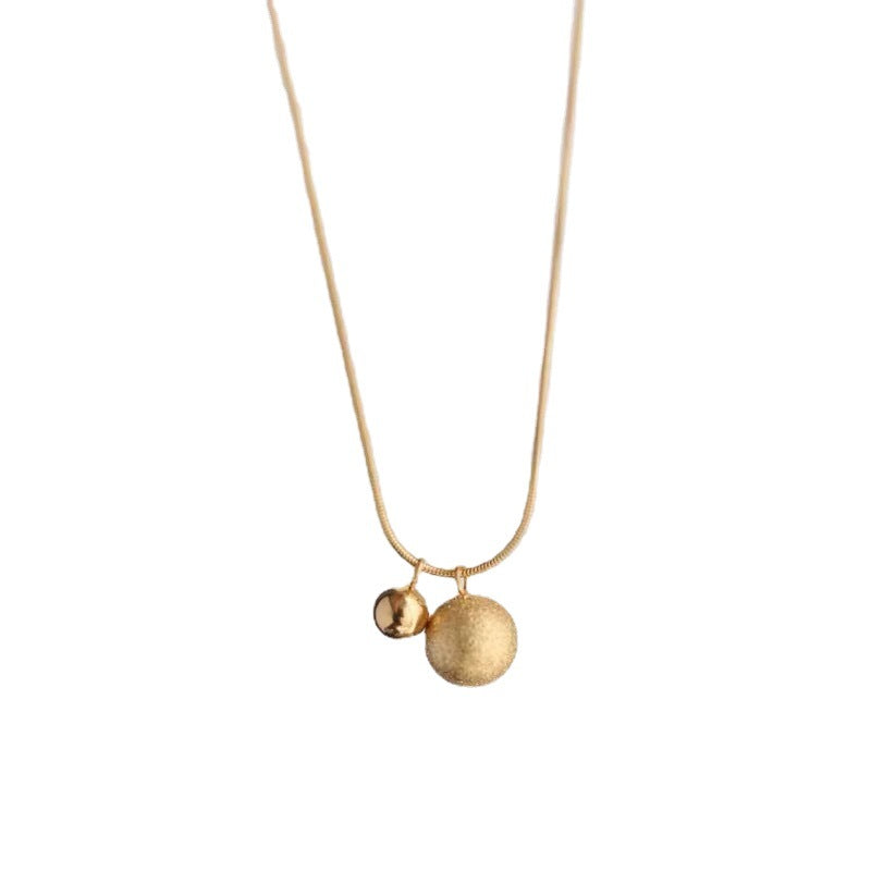 Collana minimalista in acciaio al titanio con sfera geometrica e placcatura in oro per donna e uomo