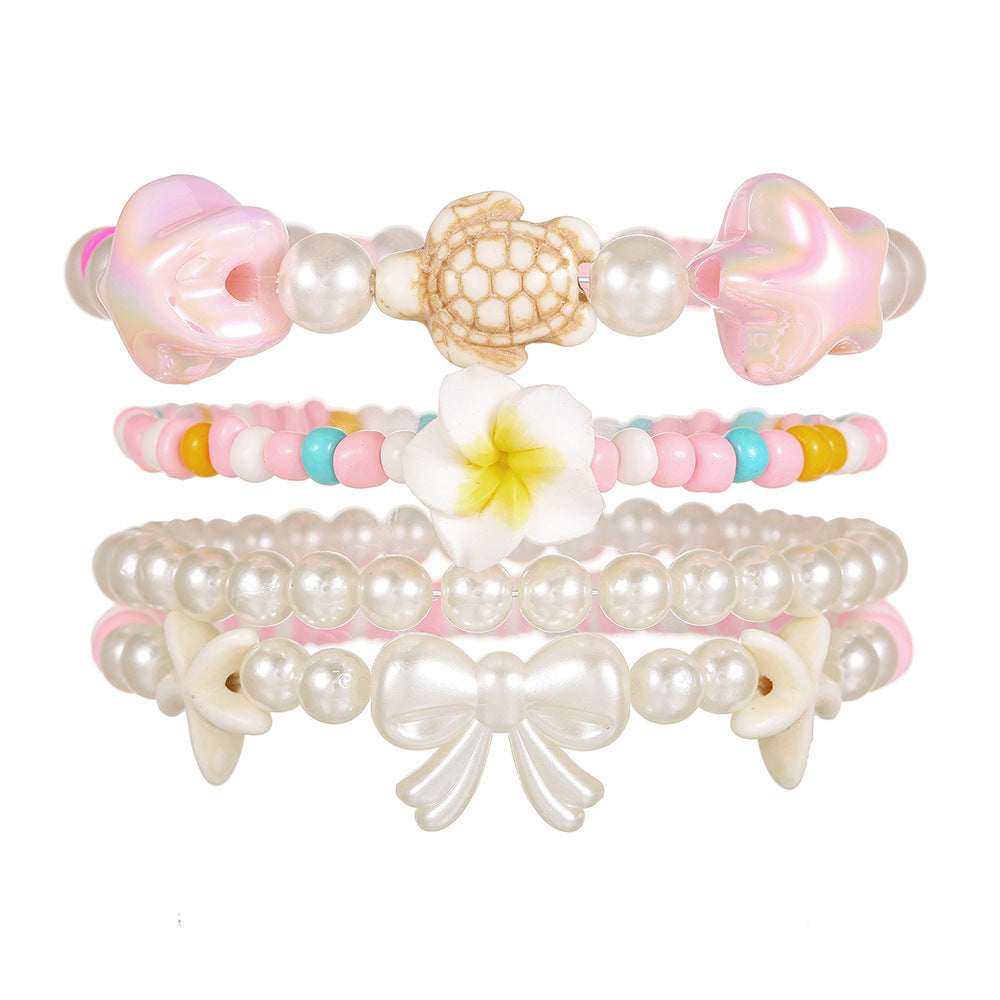 Bohemian Resin Beaded Bracelet with Turquoise Pearl Starfish Turtle and Bow Geometric Design