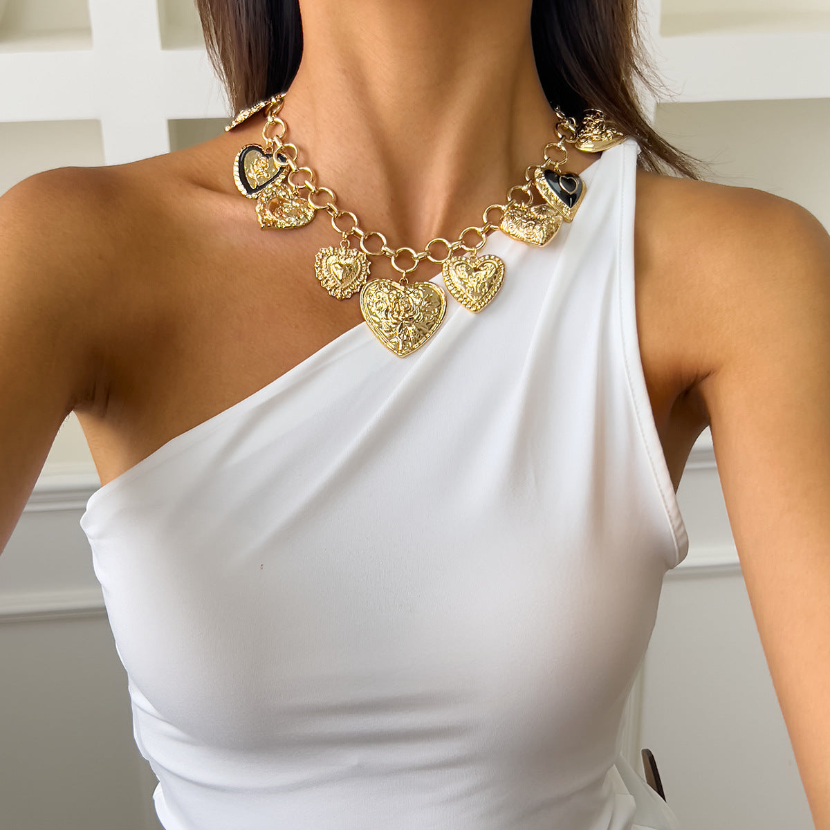 Collar con colgante de aleación en forma de corazón, dulce y atrevido, con detalle de borla para mujer