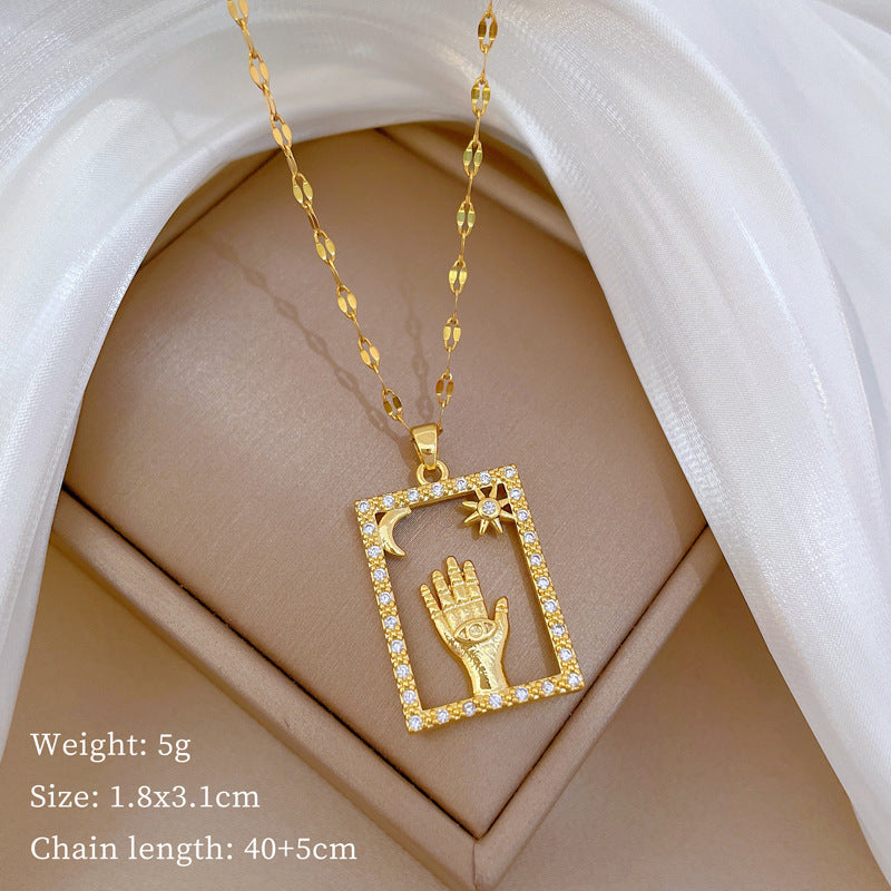 Collana pendente a luna geometrica minimalista in acciaio al titanio con accenti di strass per uomo e donna