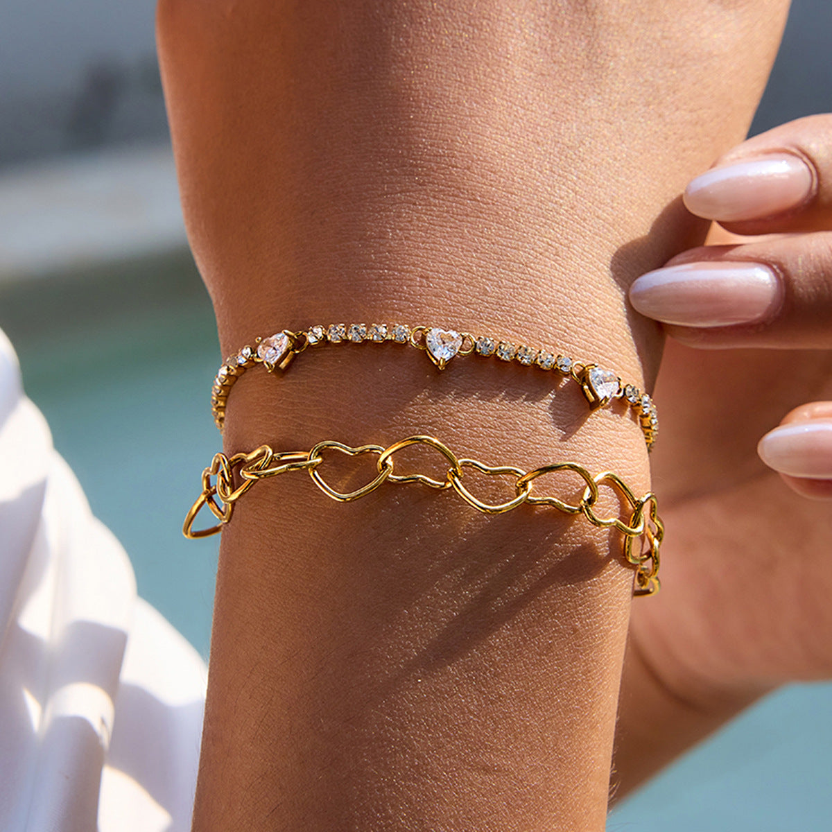 Elegante bracciale in acciaio inossidabile a forma di cuore con intarsio di strass, finitura placcata, gioielli alla moda da donna