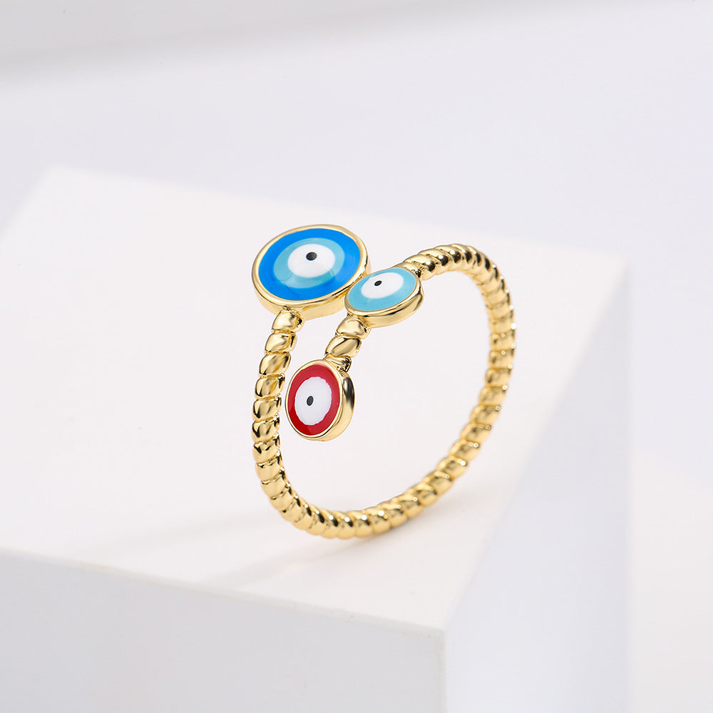 Minimalist Geometric Open Ring for Women in Brass with Gold Plating and Enamel Eye Detail