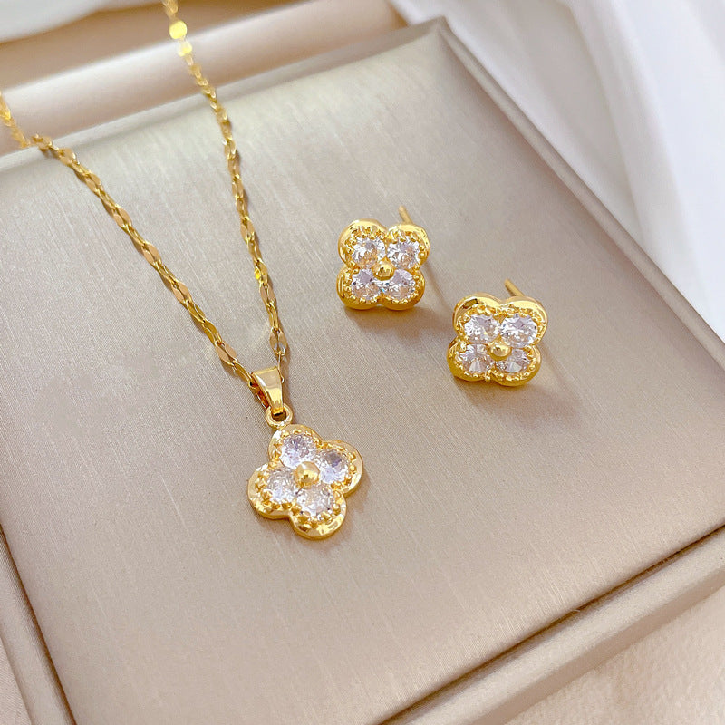Parure di Orecchini e Collana in Rame Placcato con Zirconi Geometrici di Lusso