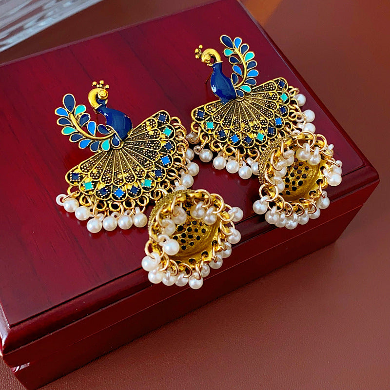 Pendientes colgantes geométricos de inspiración étnica vintage con acabado esmaltado y flecos para mujer