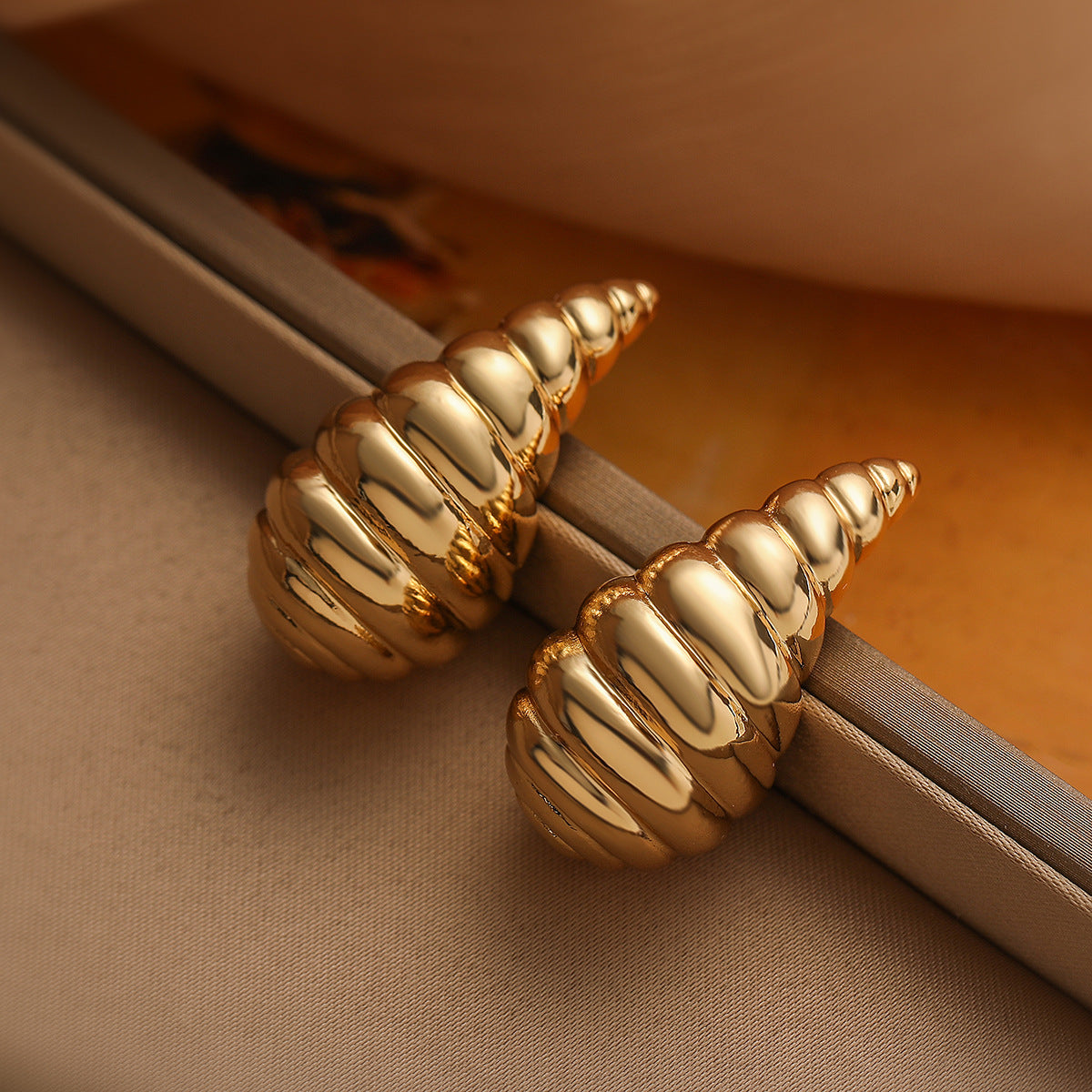 Minimalist Spiral Teardrop Earrings for Women in Copper with Gold Plating and Micro-Pave Setting